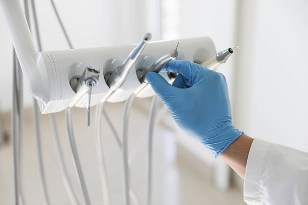 Professional Dental Implants technician working in Alexander, AR